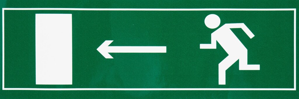 Наклейка большая 15 Направление к эвакуационному выходу налево - описание