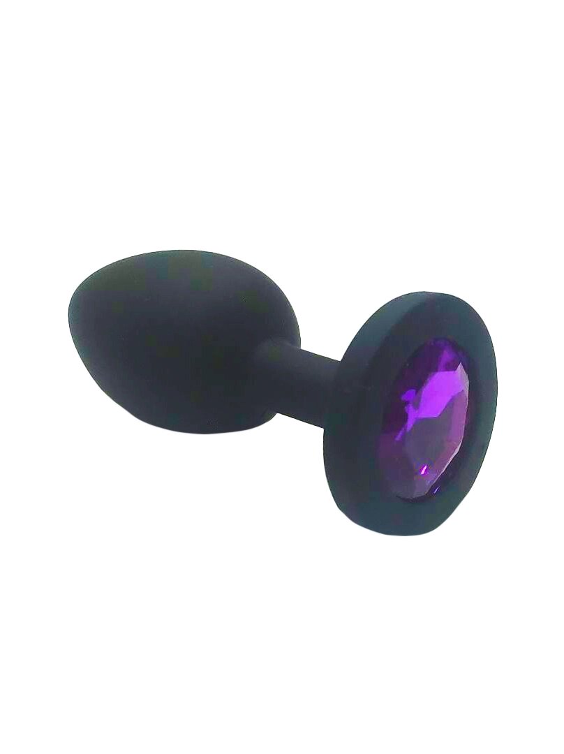 Анальная пробка из чёрного силикона с фиолетовым кристаллом (размер S) от компании Оптовая компания "Sex Opt" - фото 1