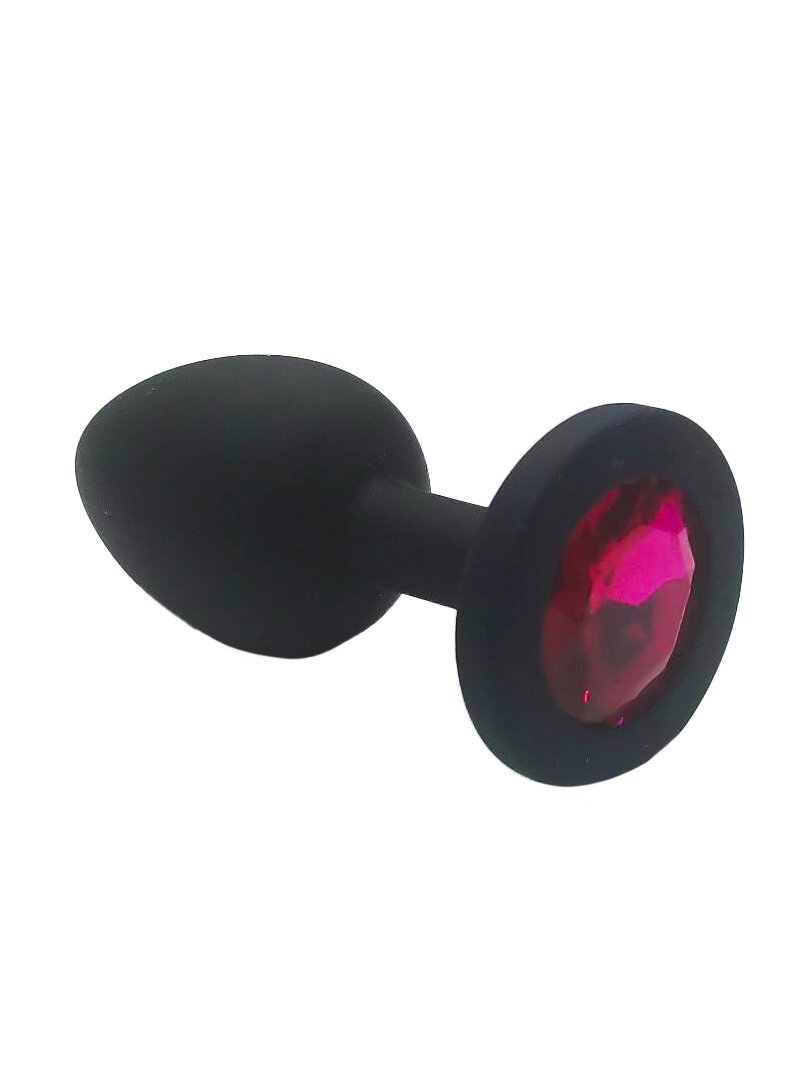 Анальная пробка из чёрного силикона с тёмно-розовым кристаллом (размер S) от компании Оптовая компания "Sex Opt" - фото 1