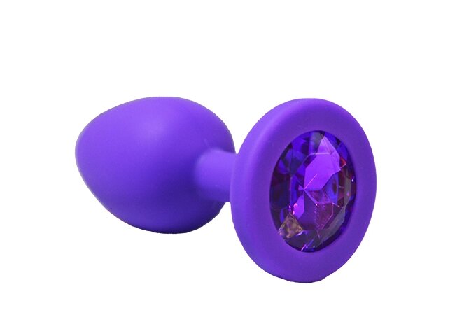 Анальная пробка из фиолетового силикона с фиолетовым кристаллом (размер S) от компании Оптовая компания "Sex Opt" - фото 1