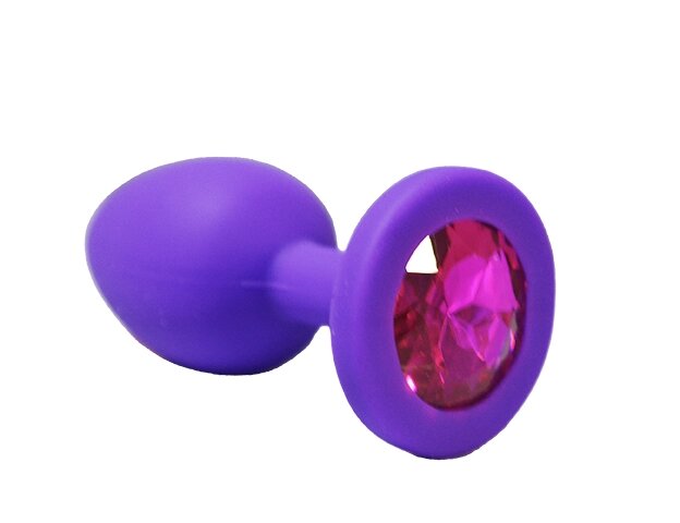 Анальная пробка из фиолетового силикона с розовым кристаллом (размер S) от компании Оптовая компания "Sex Opt" - фото 1