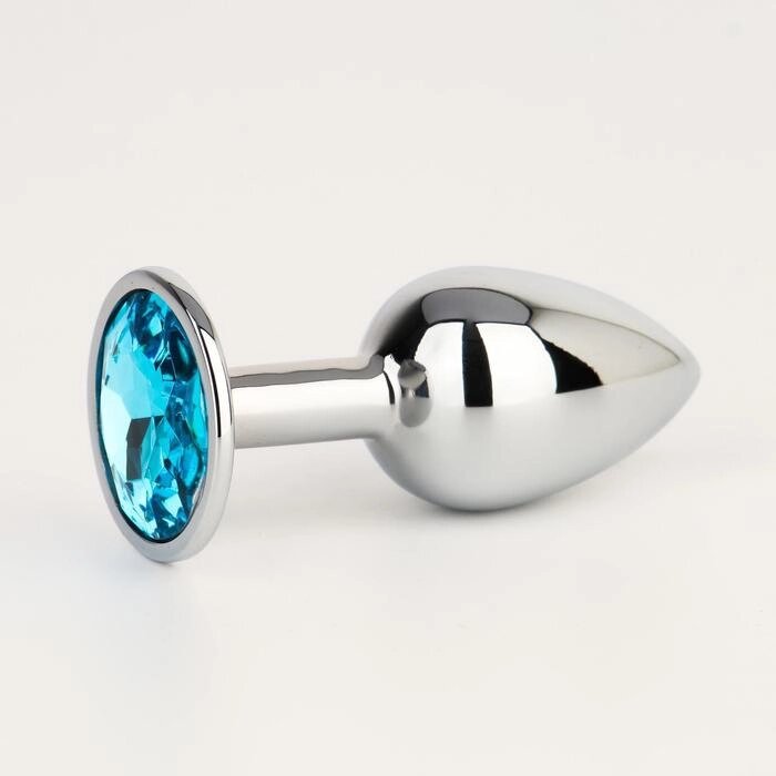 Анальная пробка серебряная, с голубым кристаллом (28 мм.) от компании Оптовая компания "Sex Opt" - фото 1