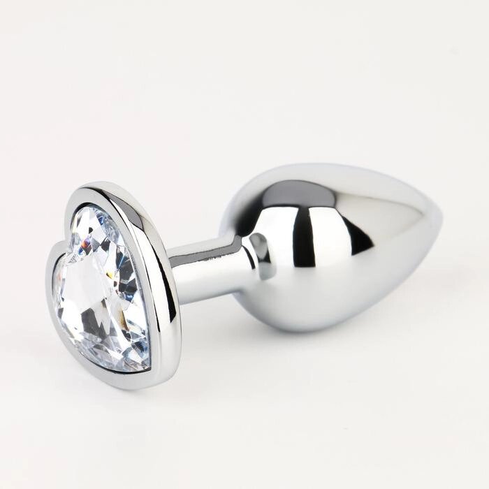 Анальная пробка серебряная, с прозрачным кристаллом в форме сердца (28 мм.) от компании Оптовая компания "Sex Opt" - фото 1