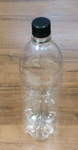 Бутылка 1Л прозрачная круглая+крышка (100шт в упак,3.3кг, ДШВ 80*77*28sm)(ВД 270х82мм)