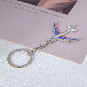 Брелок самолет Boeing 747 с эмалью, серебристый/голубой/красный