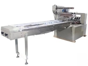 ALD-600D. Линия упаковки продукции во флоу-пак (с верхней подачей пленки)