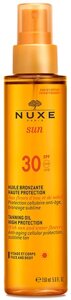 Солнцезащитное масло Nuxe Sun Taning Oil Face And Body SPF30 150 мл (3264680007019) в Алматы от компании Trento